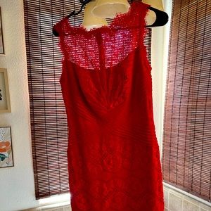 Beautiful red dress. Goes to the knee. Only worn once for a wedding.